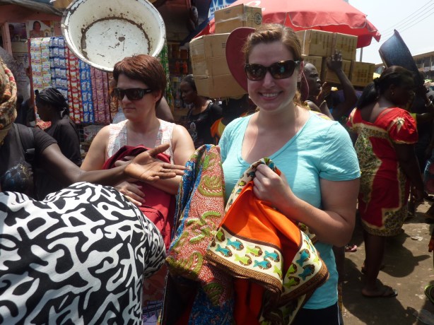 Megan bargaining over some fabric 